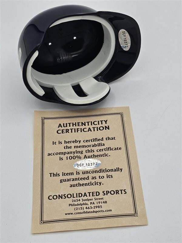 Atlanta Braves Mini Plastic Batting Helmet signed by Greg Maddux