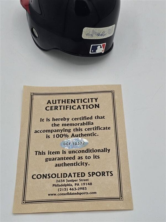 Atlanta Braves Mini Plastic Batting Helmet signed by Greg Maddux